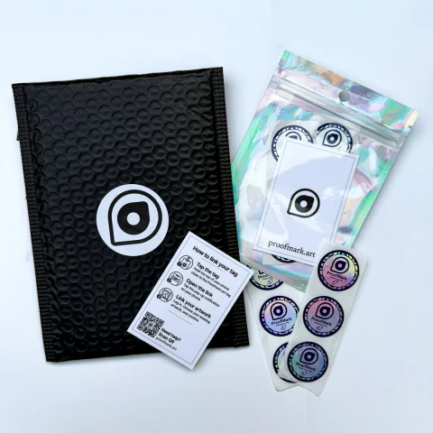 markmy.art starter kit with padded mailer, NFC stickers, and setup guide