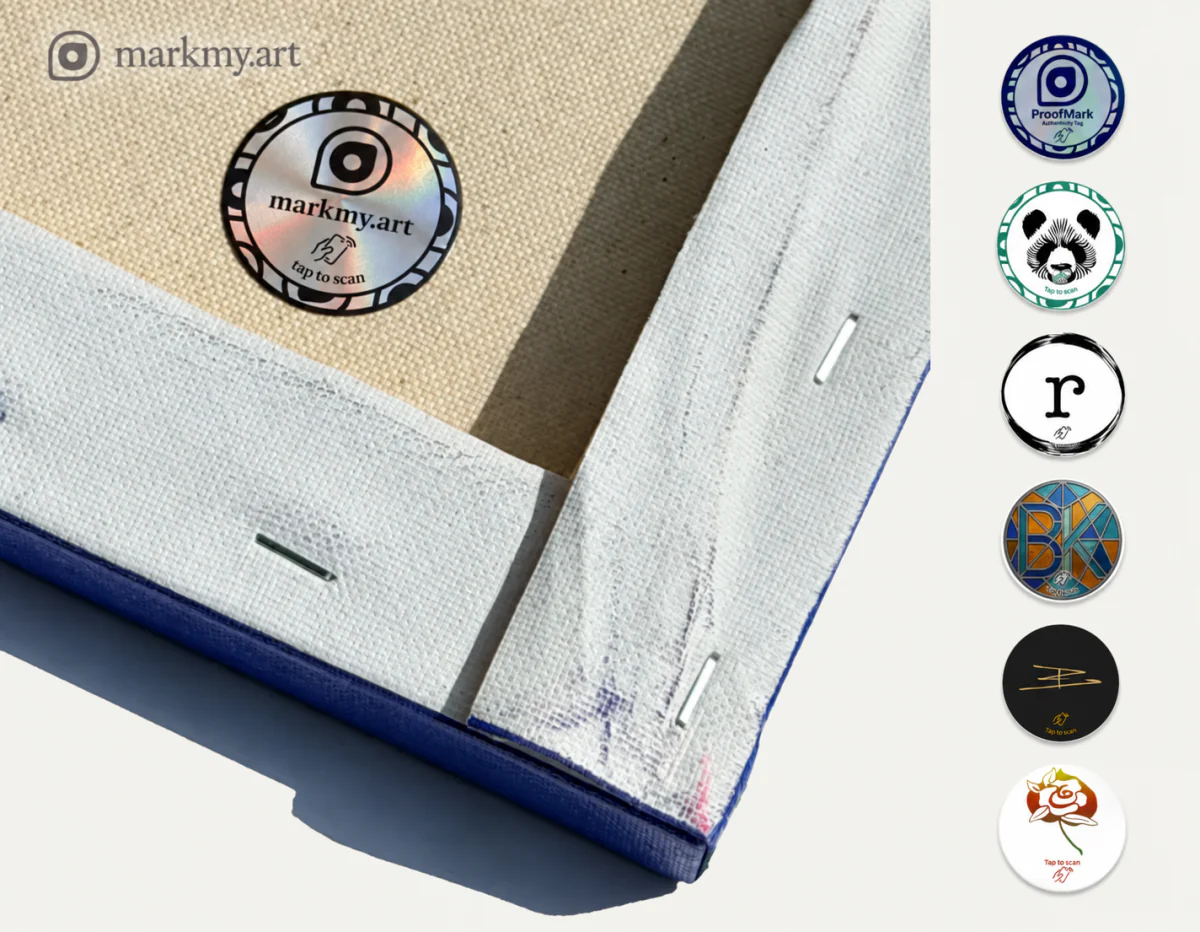A Markmy NFC tag on the back of a canvas, beside other tag designs